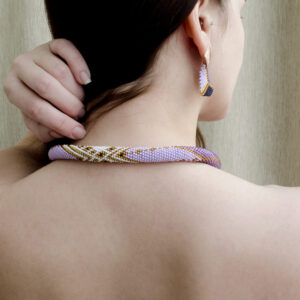violet golden necklace and beaded triangle earrings